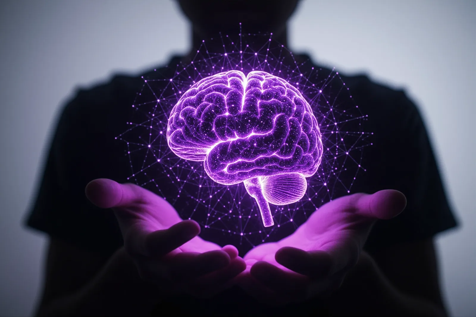 A person using a laptop with a mental health support chatbot interface.